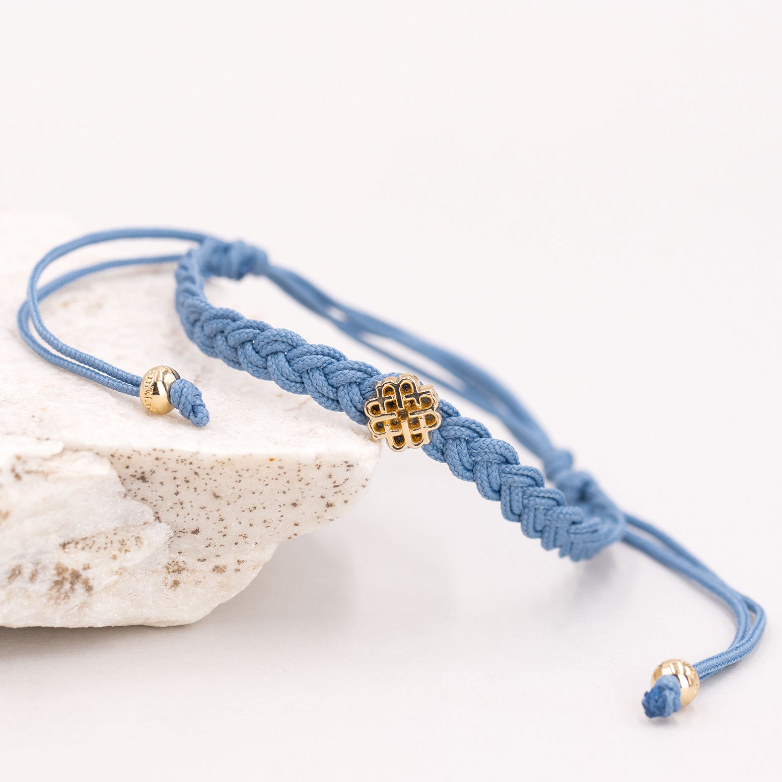 PULSERA AZUL DE LA PAZ ORO